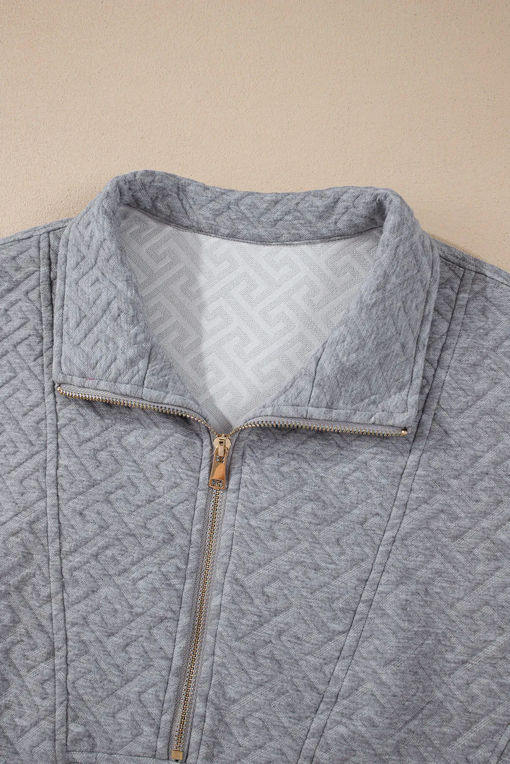 Beige Solid Textured Half Zipper Collared Sweatshirt