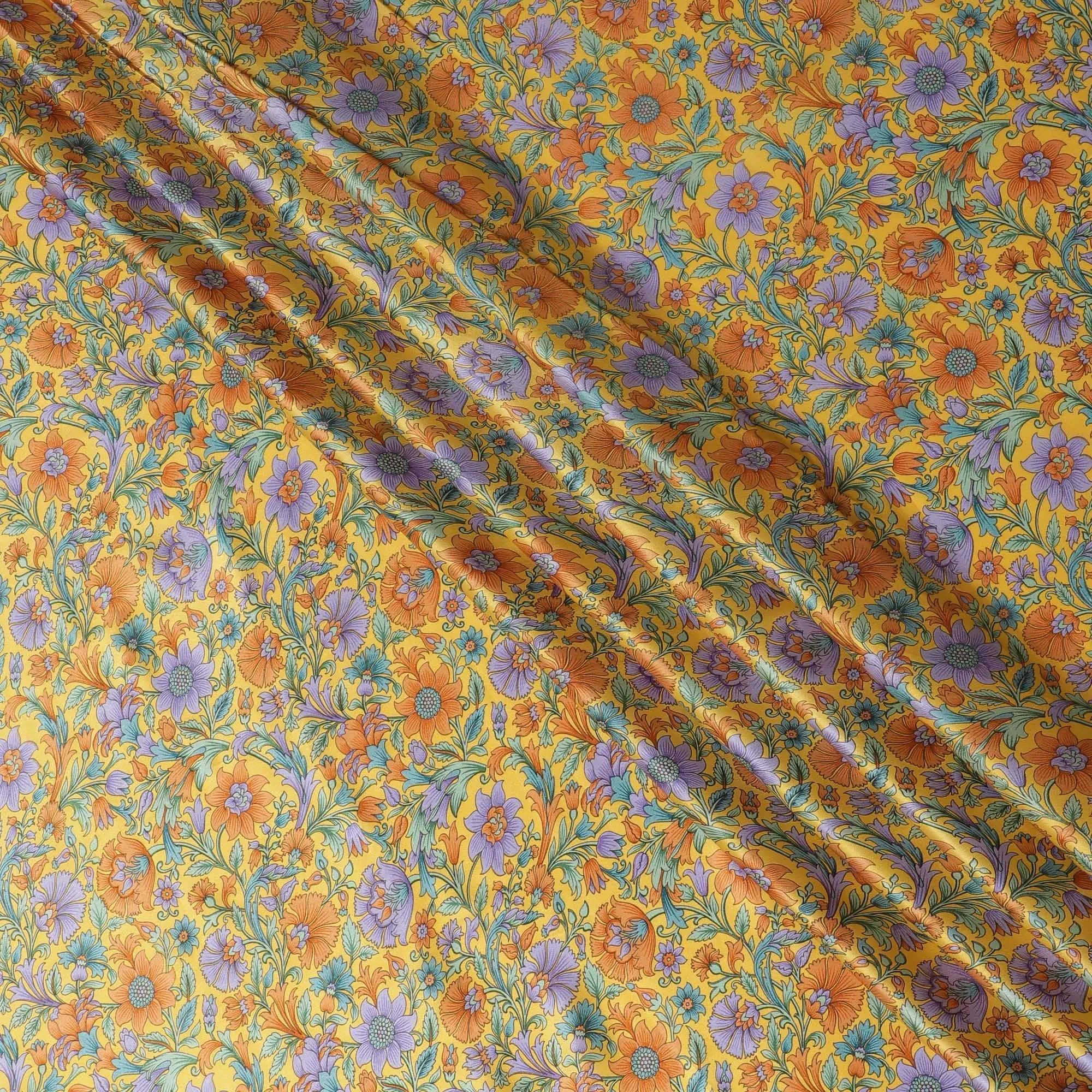 Honey yellow silk satin fabric with green, orange & violet prints in floral design-D11143