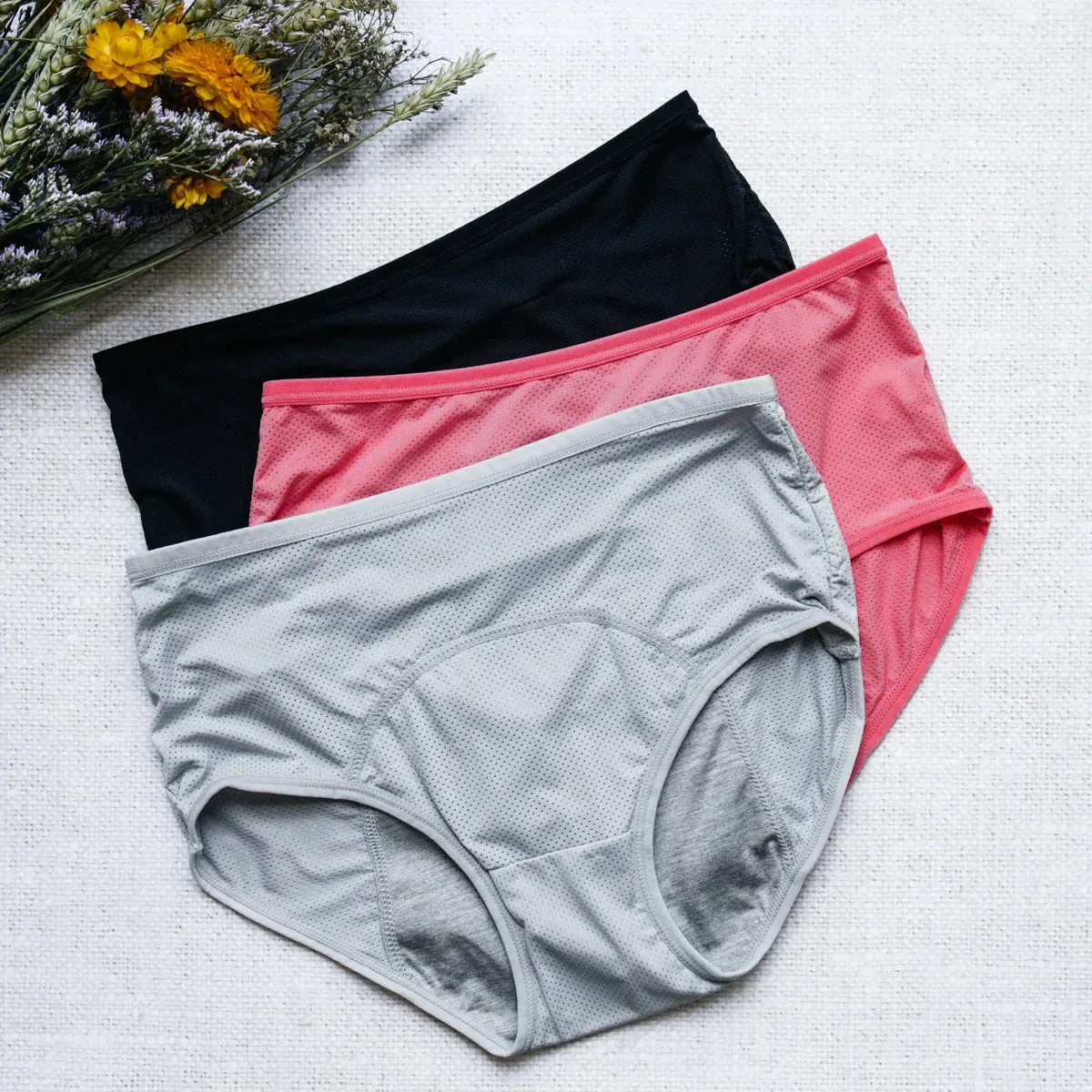 Pack de 6 Culottes Menstruelles et un collant de Compression.