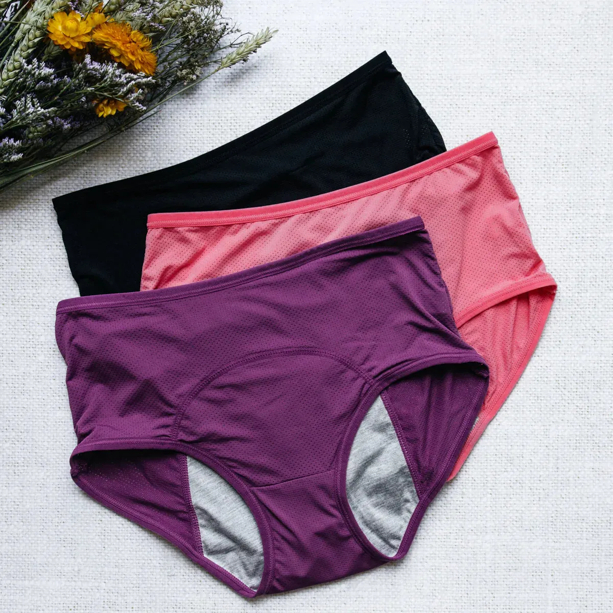 Pack de 6 Culottes Menstruelles et un collant de Compression.